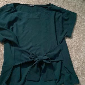 this is a green casual blouse
